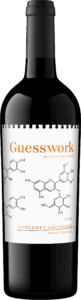 Floating bottle of 2023 Guesswork Napa County Cabernet Sauvignon by Educated Guess, featuring a clean white label with orange text and molecular graphics symbolizing wine chemistry, set against a minimalist background.